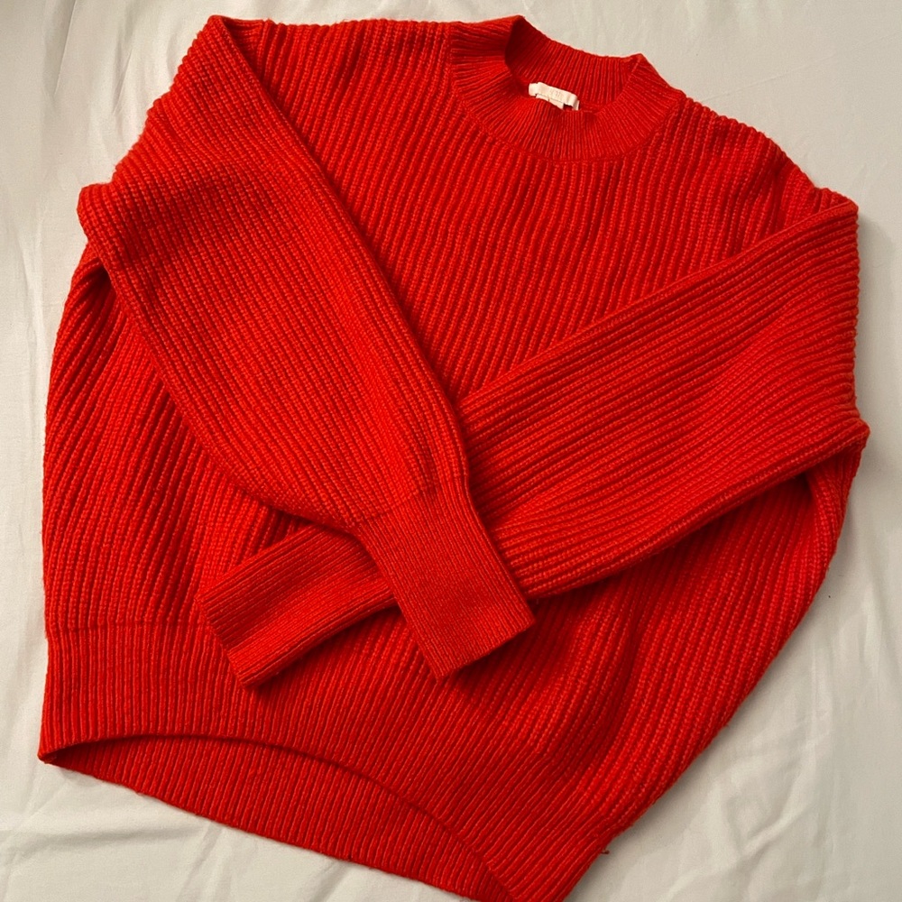 Bright orange sweater